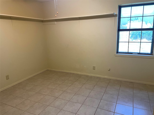 view of tiled spare room