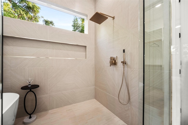 bathroom with separate shower and tub