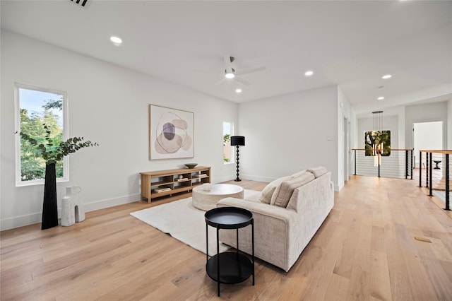 living room with light hardwood / wood-style flooring