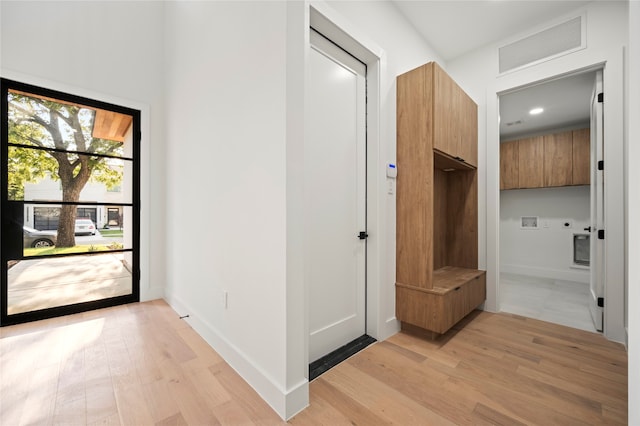 hallway featuring light hardwood / wood-style floors