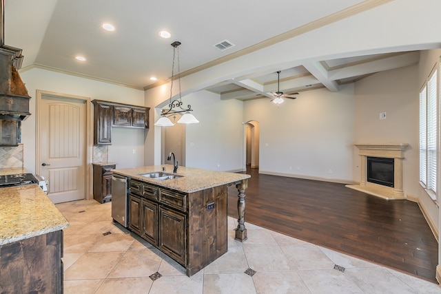 kitchen with ceiling fan, light hardwood / wood-style flooring, plenty of natural light, and light stone counters