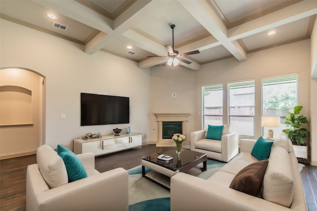 living room featuring coffered ceiling, ceiling fan, beamed ceiling, and dark wood-type flooring