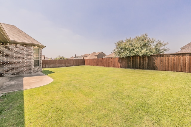 view of yard with a patio area