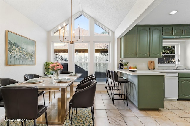 tiled dining room featuring lofted ceiling, sink, a notable chandelier, and a textured ceiling