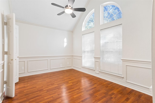 unfurnished room with ceiling fan, wood-type flooring, ornamental molding, and lofted ceiling