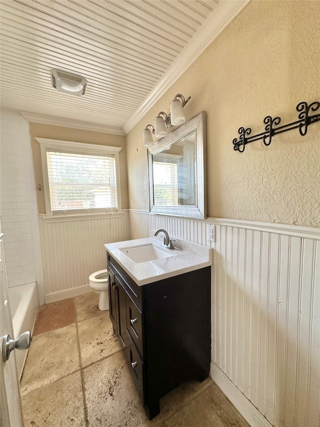 full bathroom with toilet, crown molding, tile patterned flooring, bathing tub / shower combination, and vanity