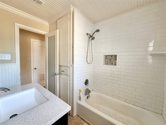 bathroom featuring washtub / shower combination, visible vents, and vanity