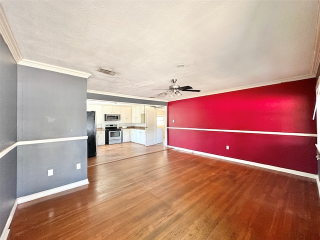 unfurnished living room featuring ceiling fan, crown molding, hardwood / wood-style flooring, and a textured ceiling