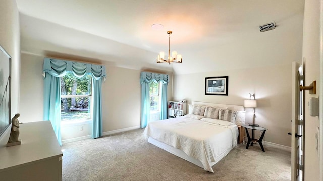 bedroom with vaulted ceiling, carpet, and an inviting chandelier