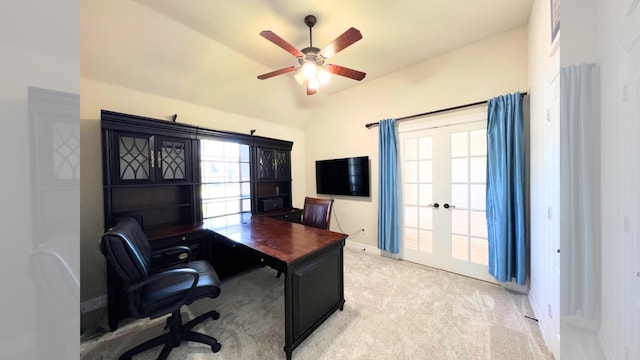 home office with ceiling fan, french doors, light carpet, and lofted ceiling