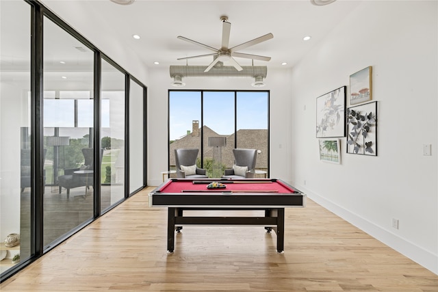 recreation room featuring ceiling fan, light hardwood / wood-style flooring, and billiards