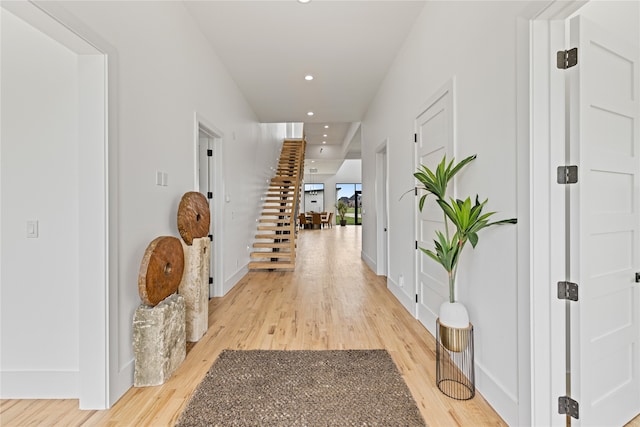 corridor featuring light hardwood / wood-style flooring