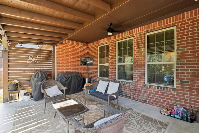 view of patio / terrace with ceiling fan and a grill