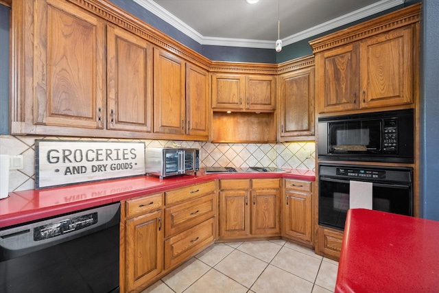 kitchen with light tile patterned floors, decorative backsplash, black appliances, brown cabinetry, and crown molding