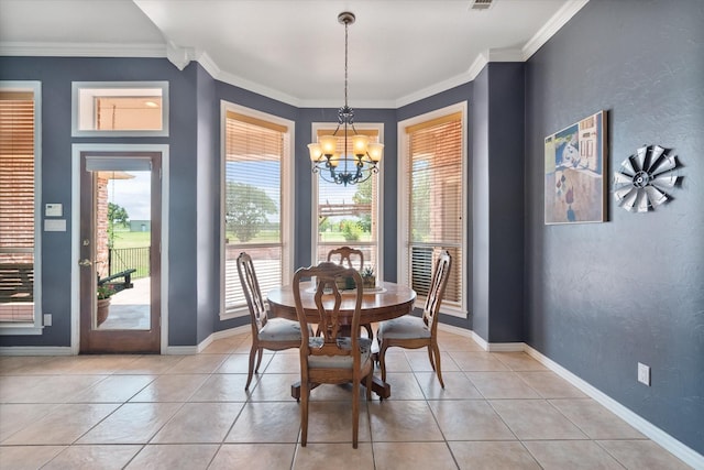 dining space with crown molding, light tile patterned floors, a textured wall, a chandelier, and baseboards