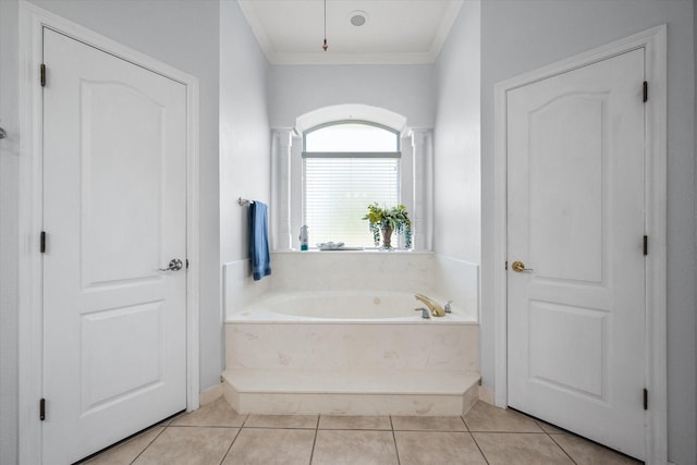 full bathroom with ornamental molding, tile patterned flooring, and a bath