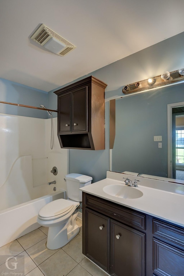 bathroom featuring visible vents, toilet, tile patterned flooring, vanity, and shower / bathing tub combination