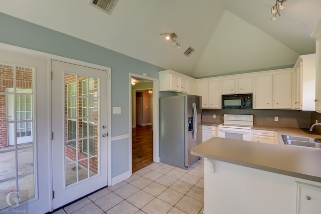 kitchen featuring light hardwood / wood-style flooring, white electric range oven, stainless steel fridge, rail lighting, and sink