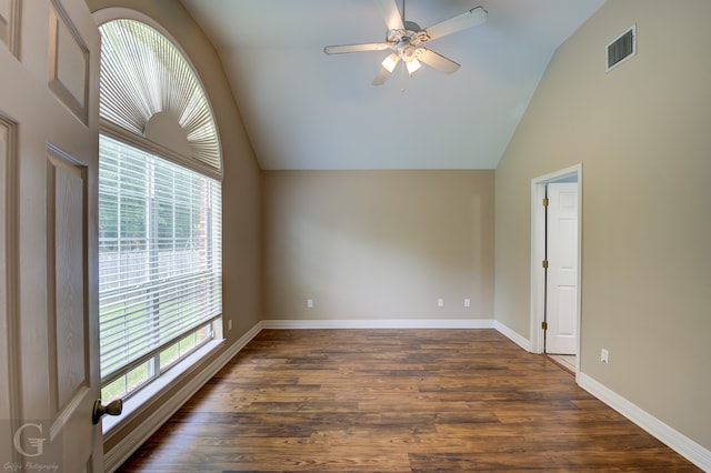 unfurnished room featuring ceiling fan, dark hardwood / wood-style floors, and lofted ceiling