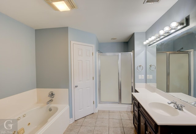 full bath featuring a shower stall, tile patterned flooring, a tub with jets, and vanity