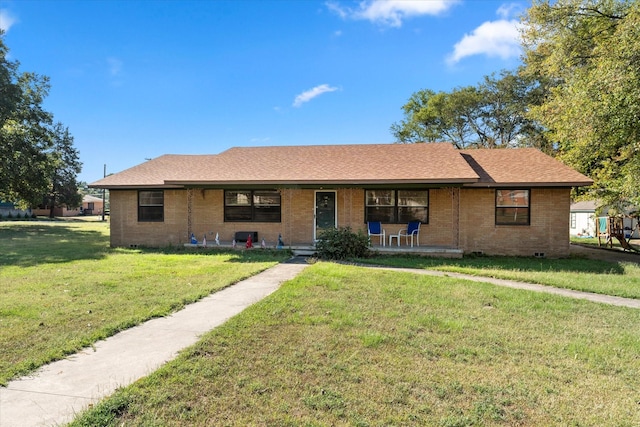 ranch-style house with a front yard