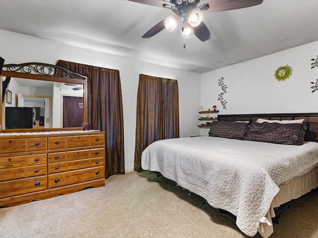 bedroom featuring carpet flooring and ceiling fan