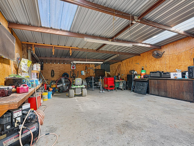 garage featuring a workshop area