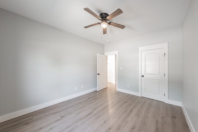 unfurnished bedroom featuring ceiling fan and light wood-type flooring