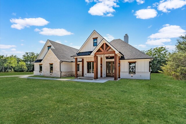 view of front of home with a front yard