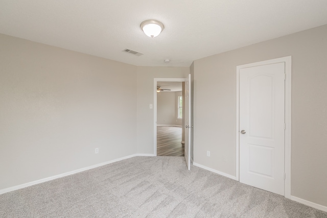 unfurnished bedroom featuring carpet flooring