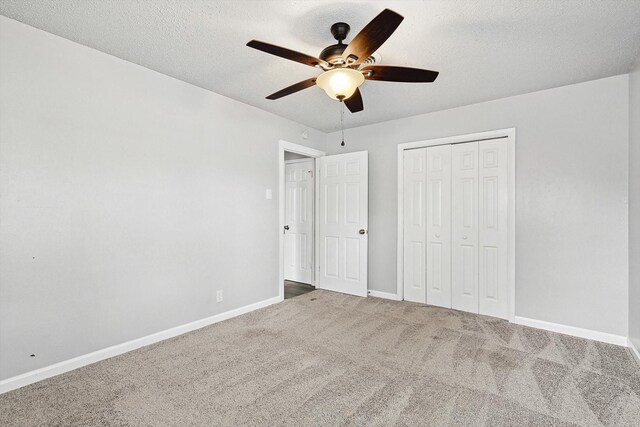 2120 Nottingham Blvd, Fort Worth, TX 76112 - unfurnished bedroom featuring ceiling fan, carpet, a textured ceiling, and a closet