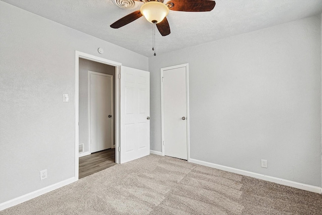2120 Nottingham Blvd, Fort Worth, TX 76112 - unfurnished bedroom with a textured ceiling, carpet floors, and ceiling fan