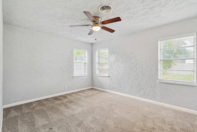 2120 Nottingham Blvd, Fort Worth, TX 76112 - empty room with ceiling fan, carpet flooring, and a textured ceiling