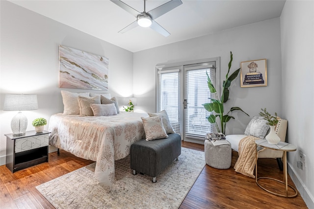 bedroom with ceiling fan, access to exterior, and dark hardwood / wood-style flooring