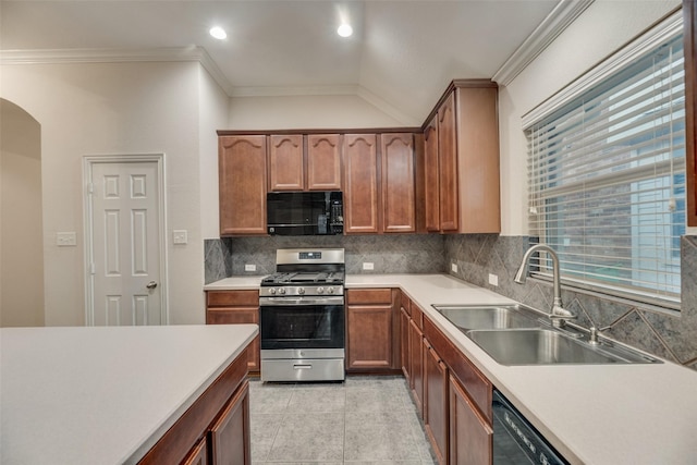 kitchen with sink, light tile patterned floors, tasteful backsplash, ornamental molding, and black appliances