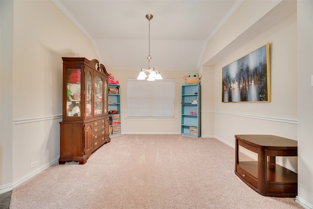 carpeted dining area featuring vaulted ceiling, ornamental molding, and an inviting chandelier