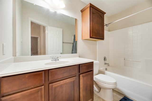 full bathroom with tile patterned flooring, vanity, washtub / shower combination, and toilet