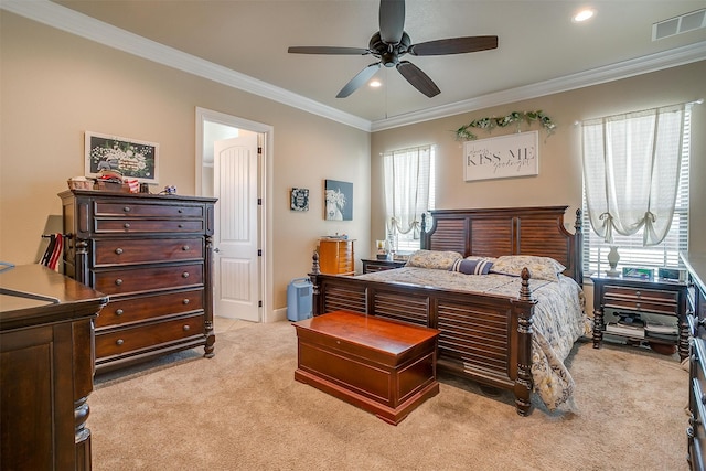 carpeted bedroom with ceiling fan and crown molding