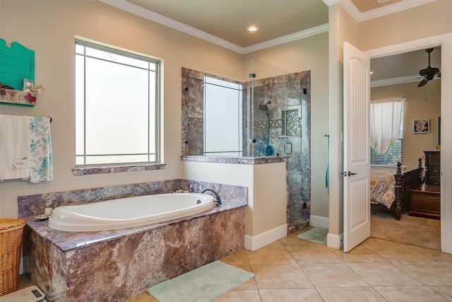 bathroom featuring ceiling fan, tile patterned floors, shower with separate bathtub, and a wealth of natural light