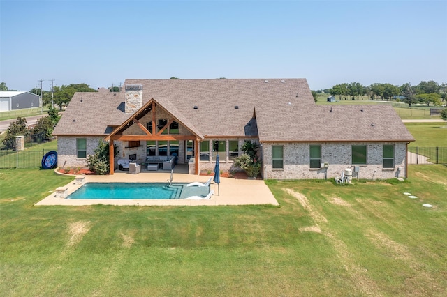 view of pool featuring a lawn, a water slide, and a patio area