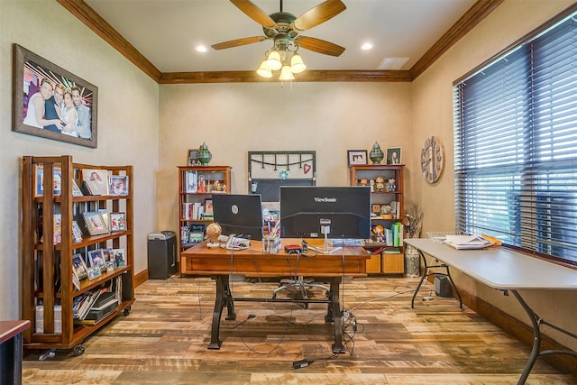 office with light wood-type flooring, ornamental molding, and ceiling fan