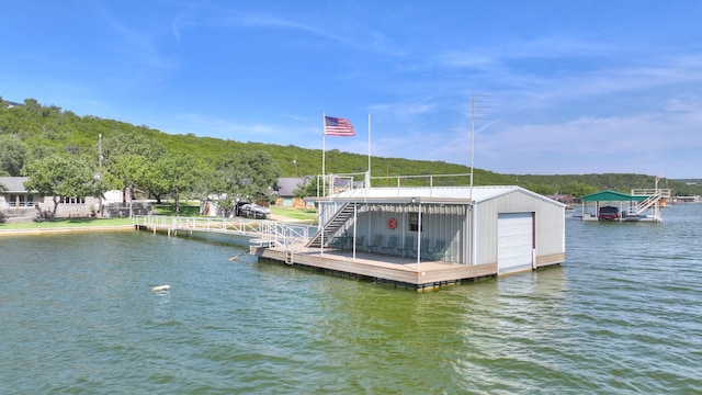 dock area featuring a water view