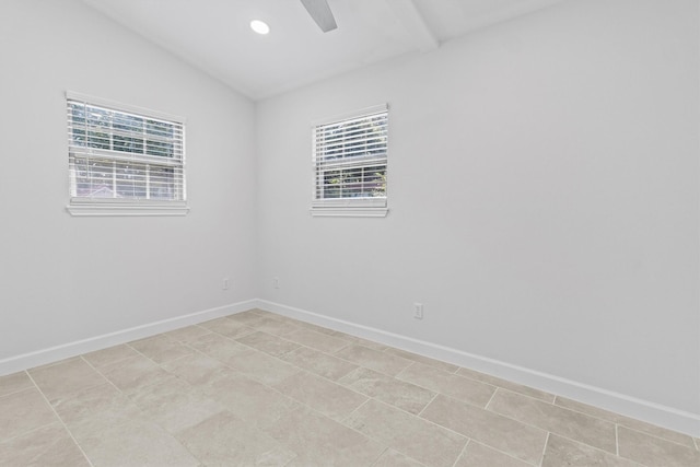 empty room featuring ceiling fan, vaulted ceiling, recessed lighting, and baseboards