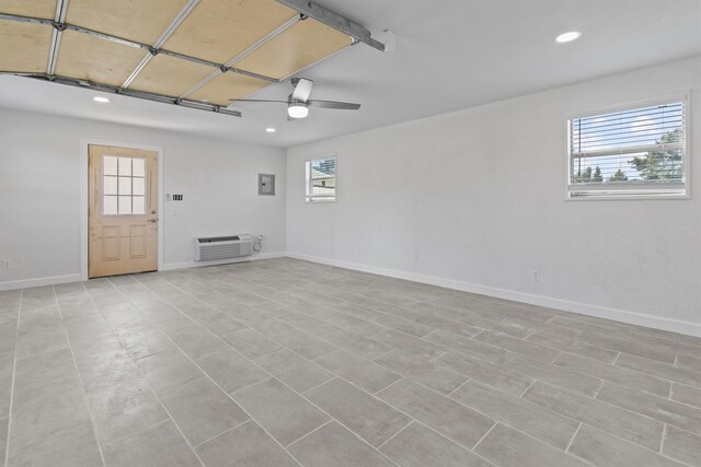 unfurnished living room with ceiling fan, french doors, light tile patterned floors, and a wealth of natural light