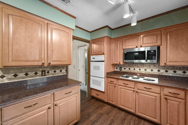 kitchen with backsplash, a textured ceiling, white appliances, crown molding, and dark wood-style flooring