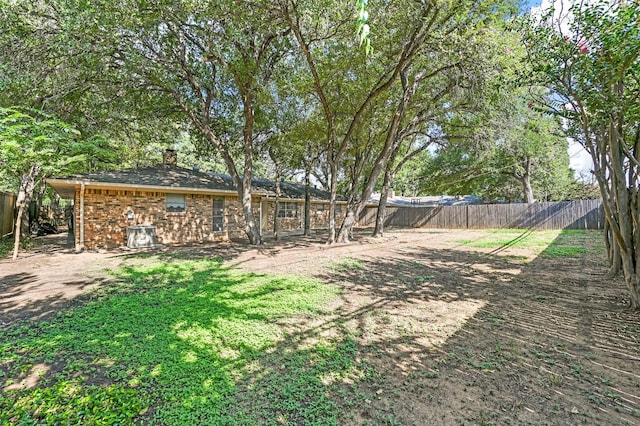 view of yard featuring a fenced backyard