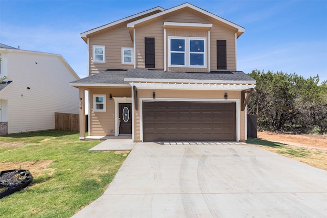 view of front facade with a front lawn and a garage