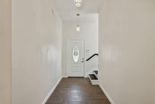 doorway to outside featuring dark hardwood / wood-style flooring