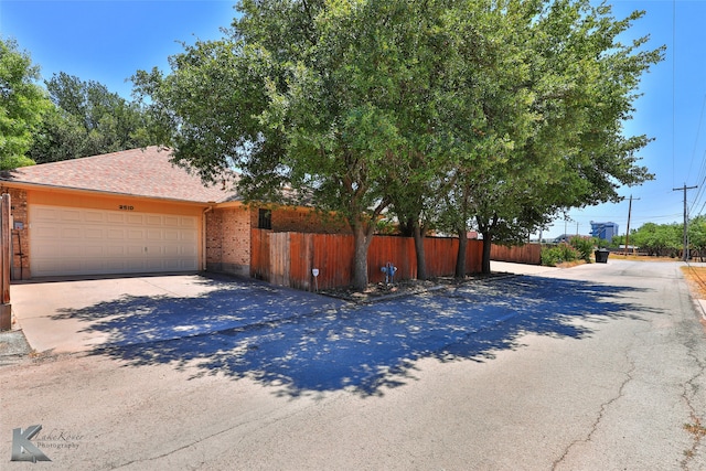 exterior space featuring a garage