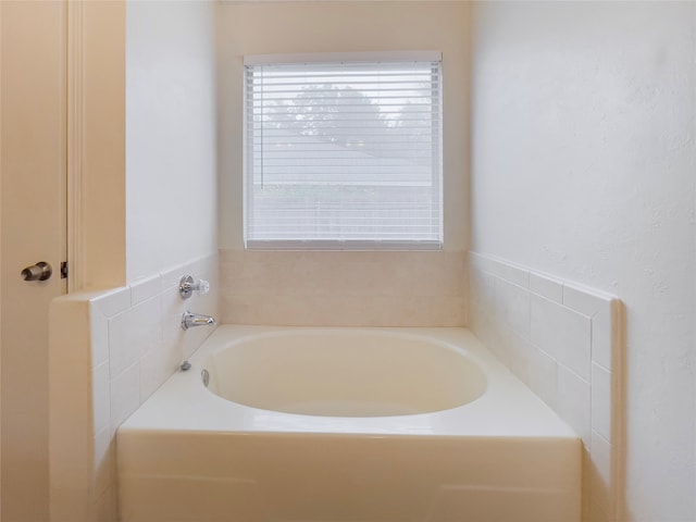 bathroom with a bath